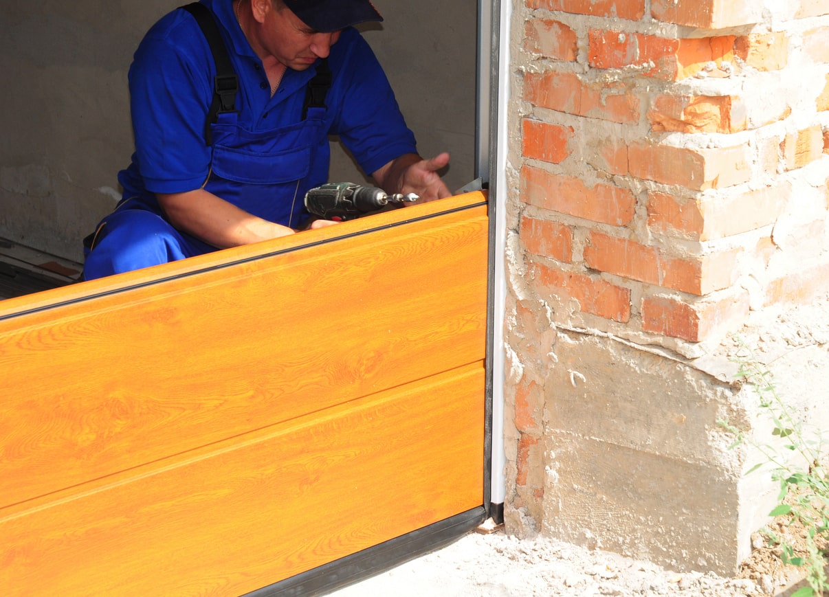 panel being replaced on garage door